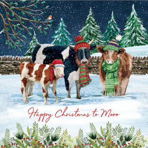 A Christmas card showing three cows wearing wooly hats in the snow