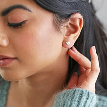 Load image into Gallery viewer, Close-up of a woman wearing a heart-shaped earring.